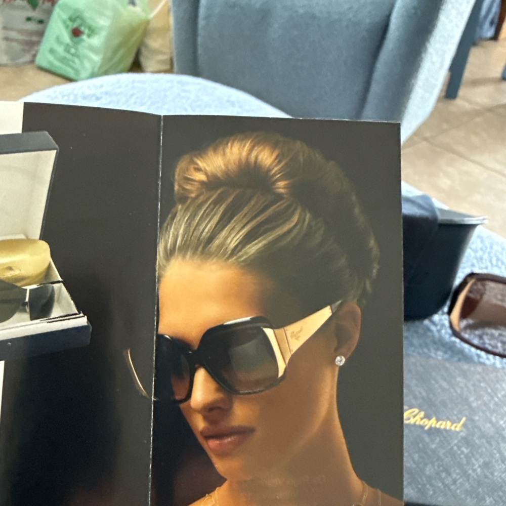 Chopard Women's Sunglasses with Black Frame and Gold Detailing